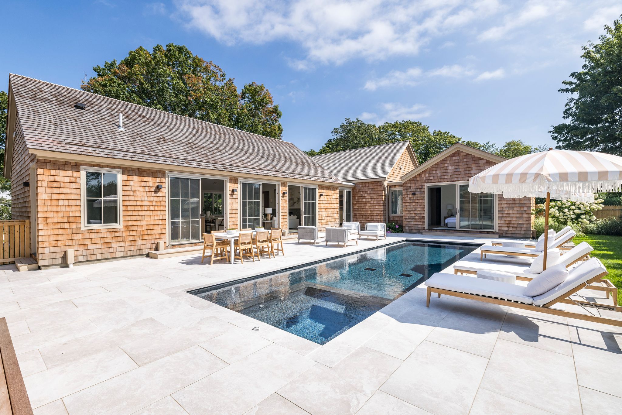 31 Edward Lane, Southampton Village: shingled house and pool house around a heated pool, built by Corbel Developments